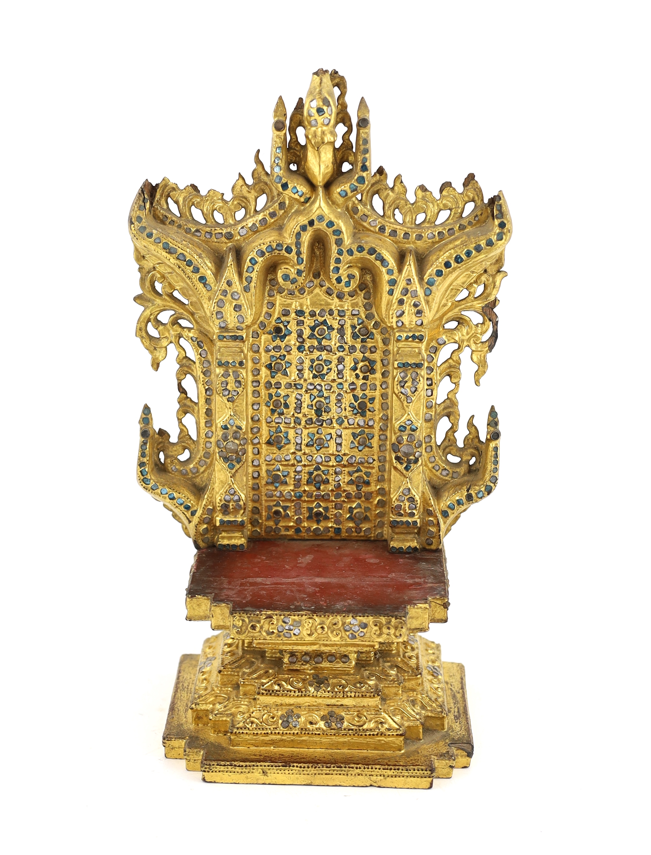 A Burmese gilt bronze seated figure of Jambupati Buddha on a throne, Shan, 17th-18th century, losses to headdress